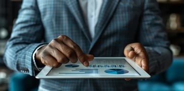 A person holding a tablet.