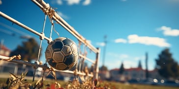 a football ball on a fence