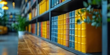 Colorful books on library shelf.