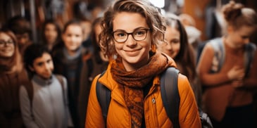 a person wearing glasses and a backpack